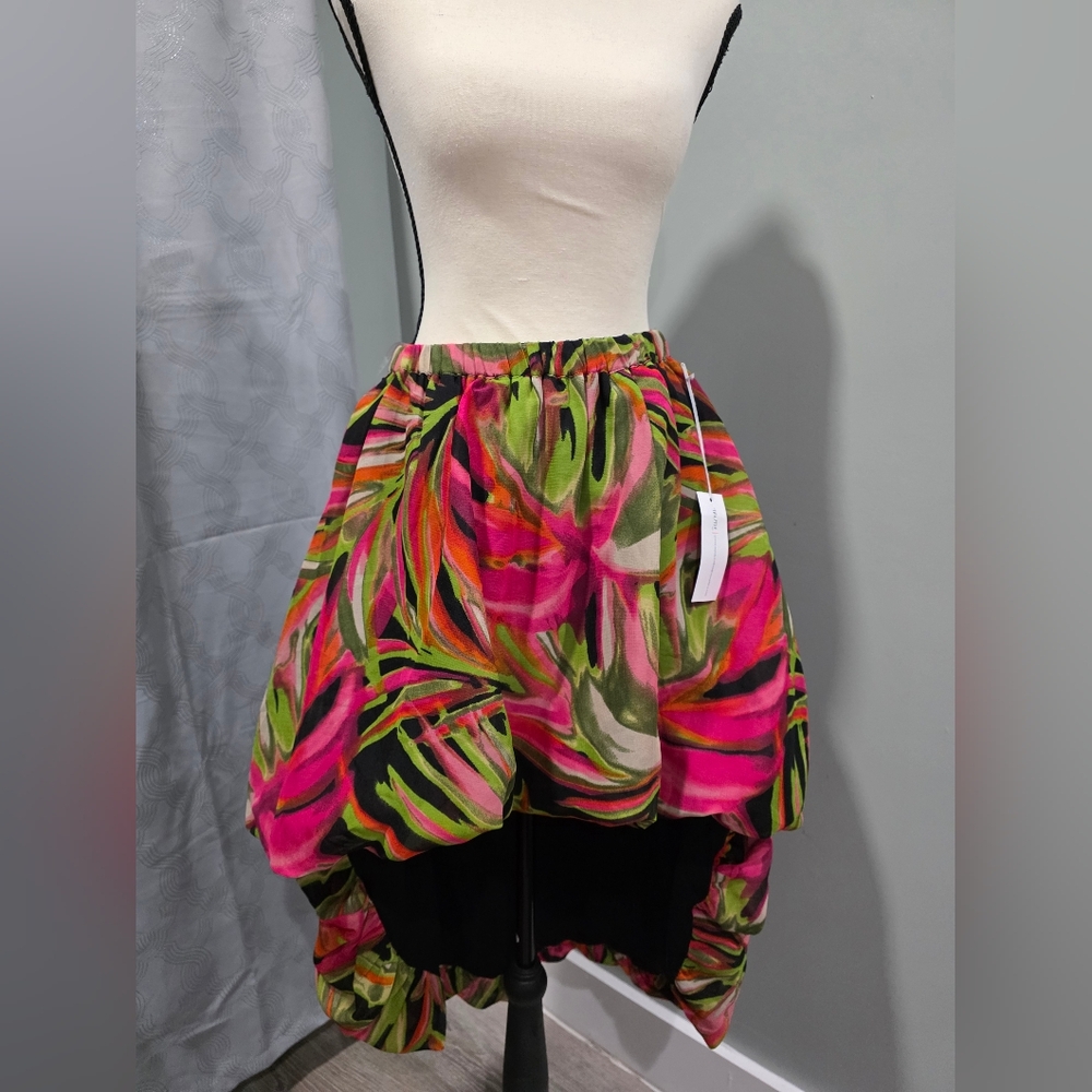 Balloon skirt with a shorter front in bright pink and green Truth NYC.tropical.